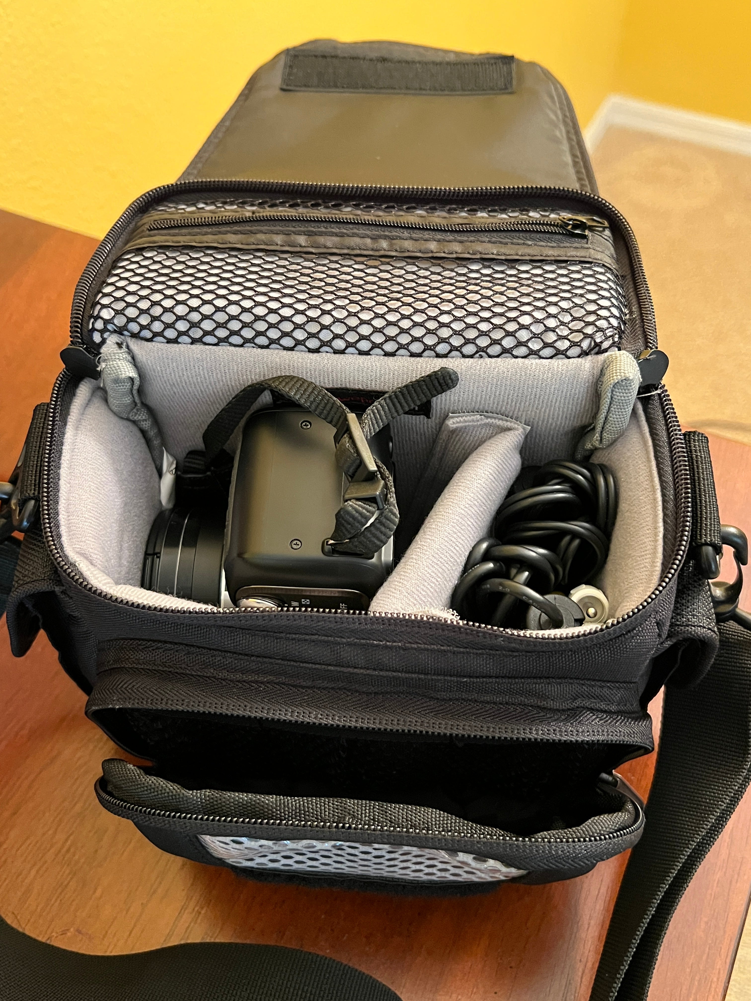 Nikon Coolpix L100 10MP Digital Camera with 15x Optical VR Zoom + Lowepro Case & Accessories