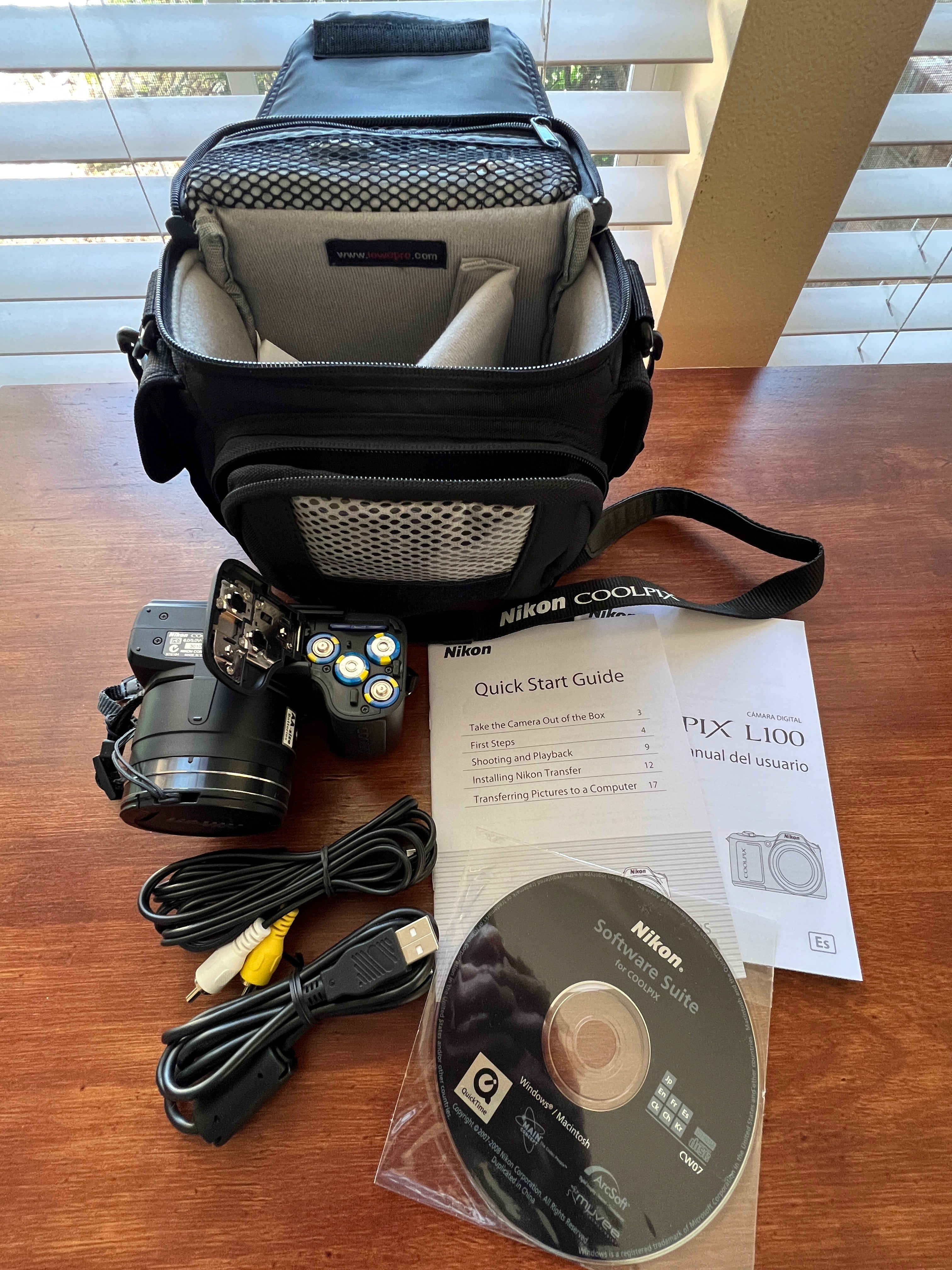 Nikon Coolpix L100 10MP Digital Camera with 15x Optical VR Zoom + Lowepro Case & Accessories