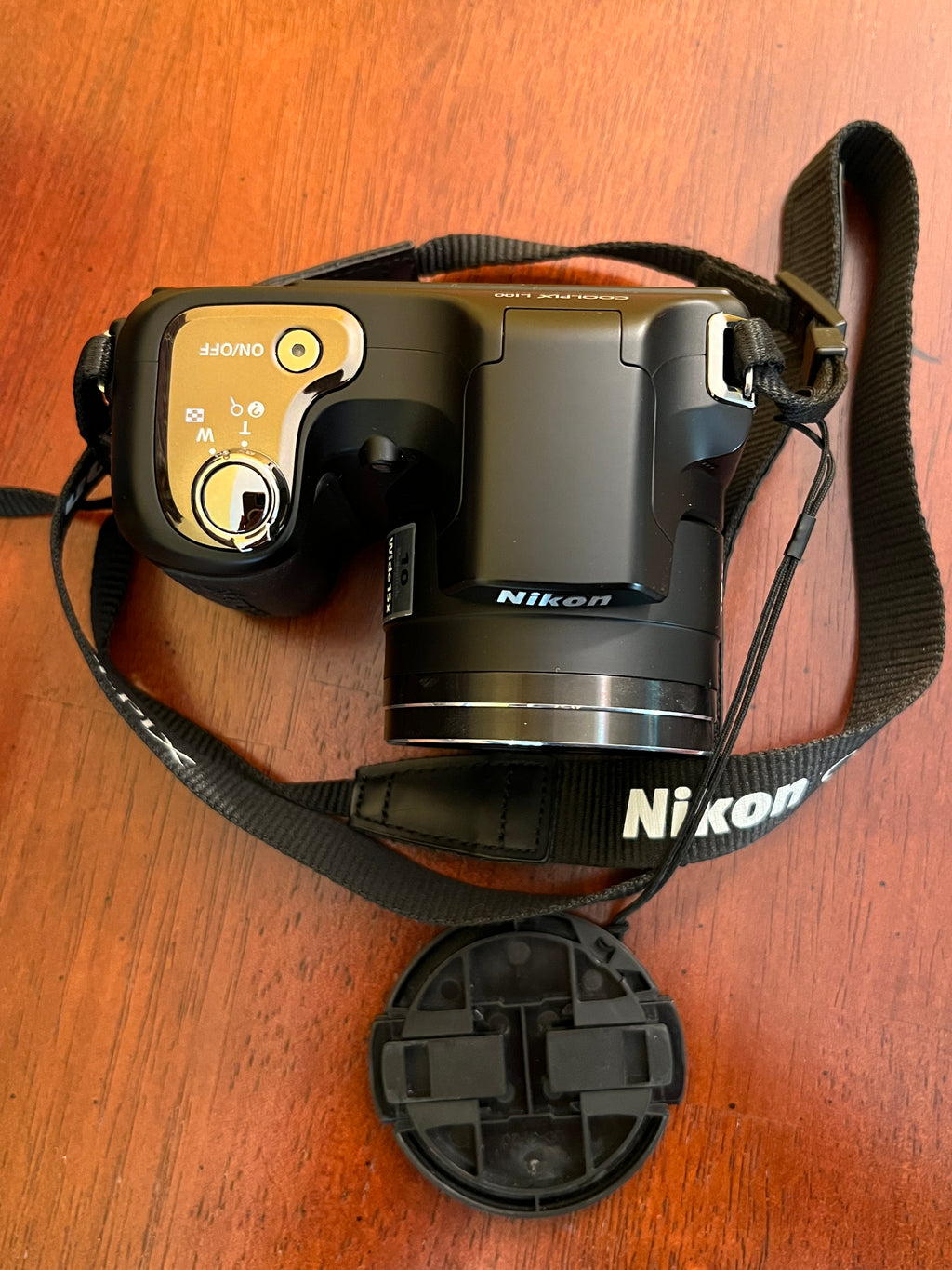 Nikon Coolpix L100 10MP Digital Camera with 15x Optical VR Zoom + Lowepro Case & Accessories